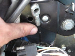 Melted plastic jammed up the handbrake cable