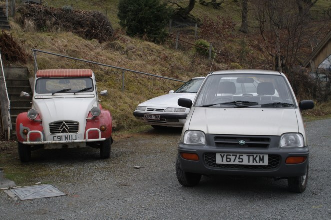 Nippa with the car it is temporarily replacing - my rusty 2CV