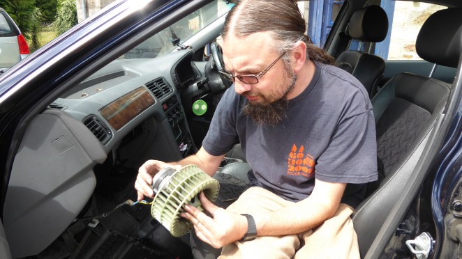 Essential holiday antics - fan blower motor removal.