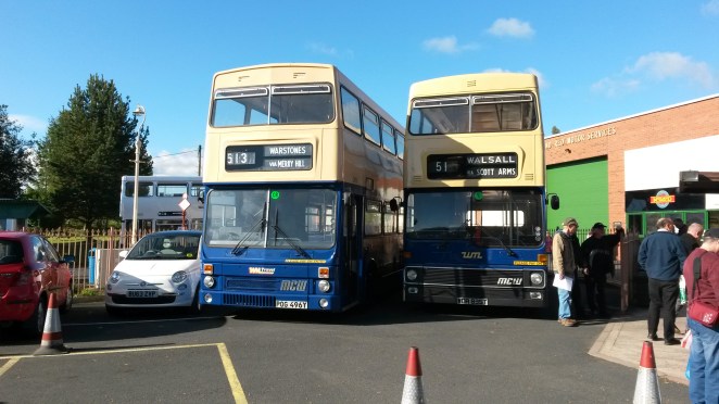 A pair of West Midlands Travel Metrobuses.