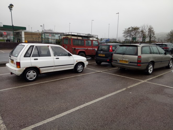 Kia Pride, H-reg Land Rover and my mighty Omega.